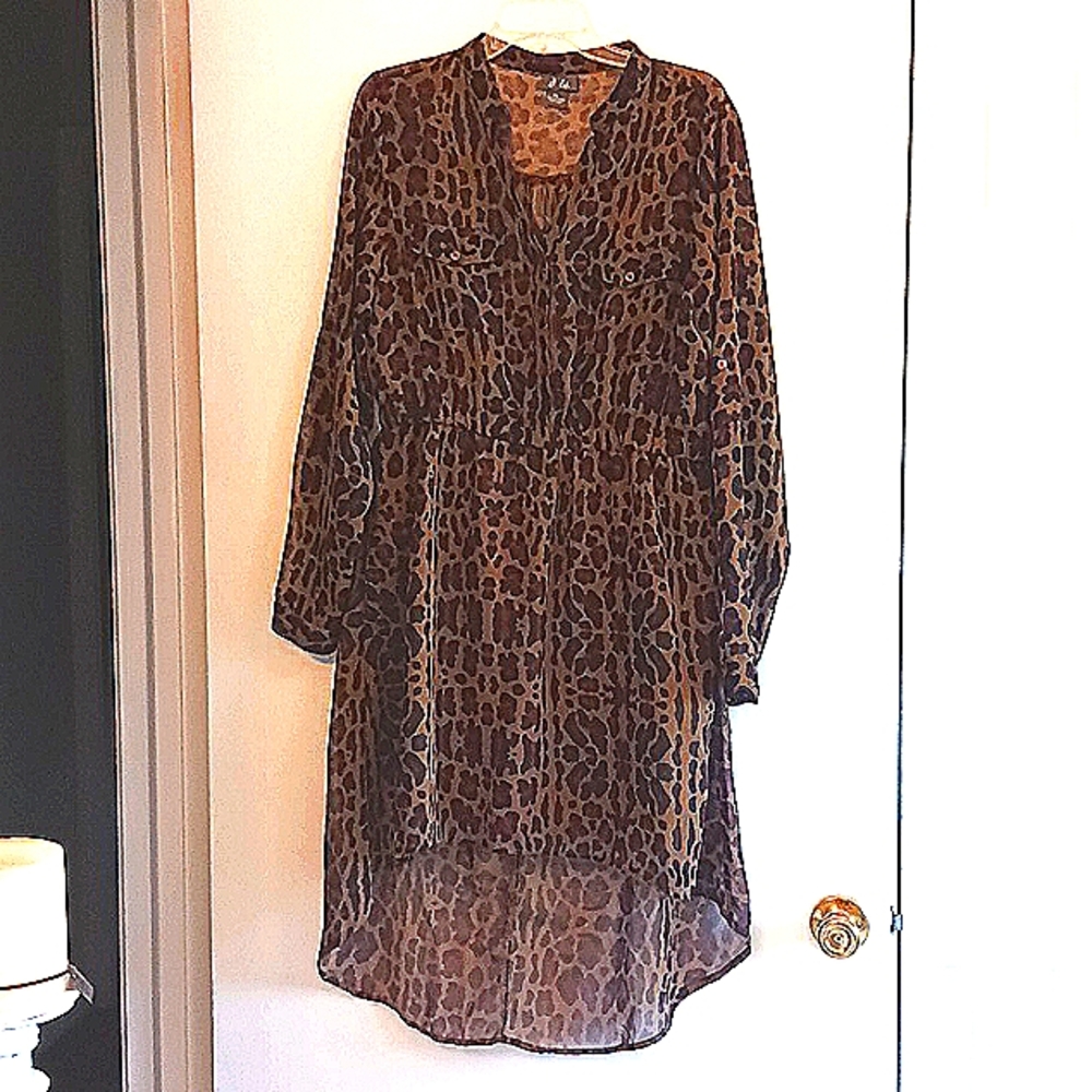 Women's dress xl...elastic waist...front knee lenght...back longer